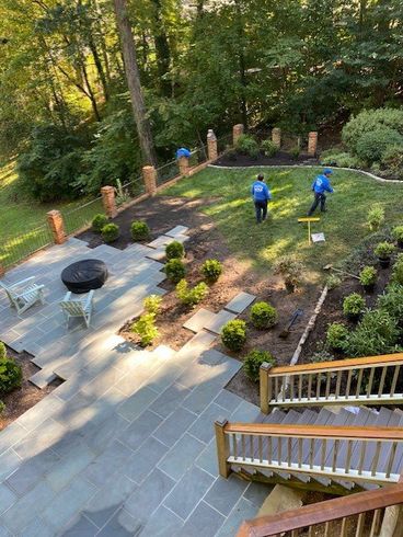 Man Mowing The Grass — Henrico, VA — Amigos Landscaping
