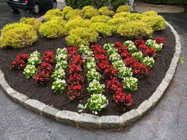 Garden Worker Trimming Plants — Henrico, VA — Amigos Landscaping