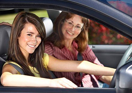 trainee smiling with confidence south coast driving school trainee smiling with confidence