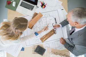 two architects discussing plans
