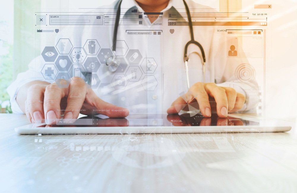 Medicine doctor hand working with modern digital tablet with computer interface as medical network concept