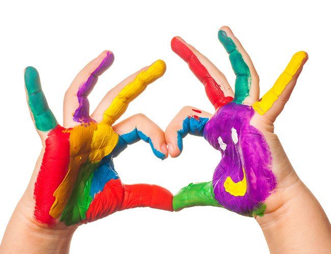 Child Care — Child hand with colorful paint in Oakland, CA Child Care — Child hand with colorful paint in Oakland, CA