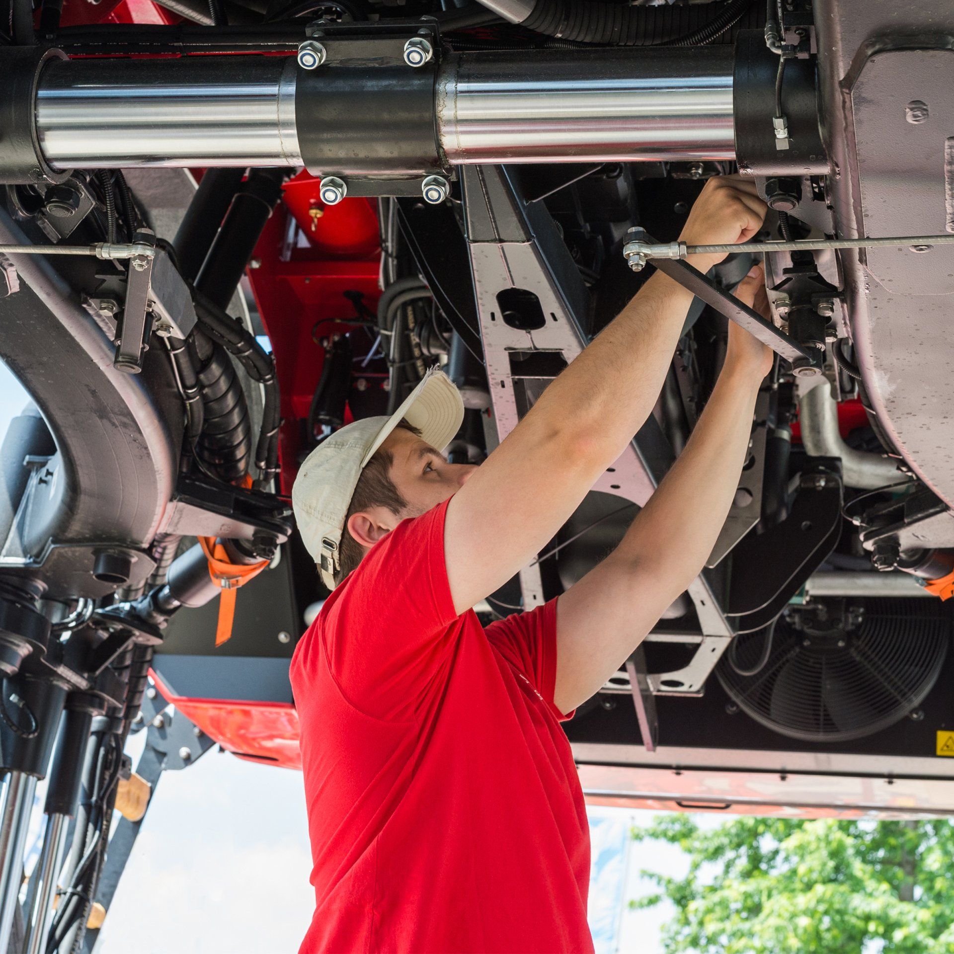 Mechanic Working Underneath a Lifted — Portsmouth, VA — Hydraulic Repair Corp