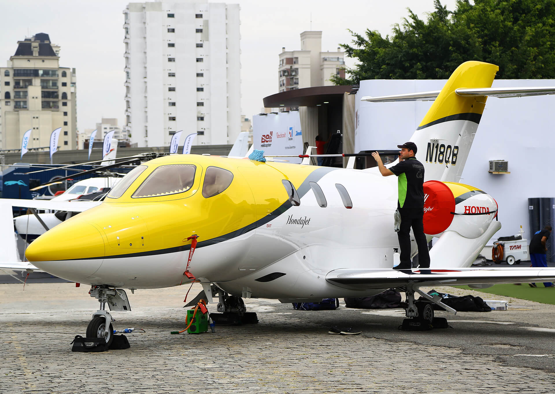 Levon Avitaion crew member cleaning an airplane