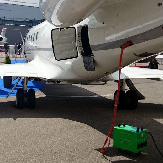 Aircraft being charged on the ground with a Portable 28VDC Continuous Power Unit