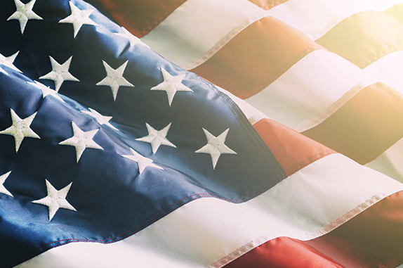 Closeup Ruffled American Flag — Salinas, CA — Diaz Bros Bail Bonds