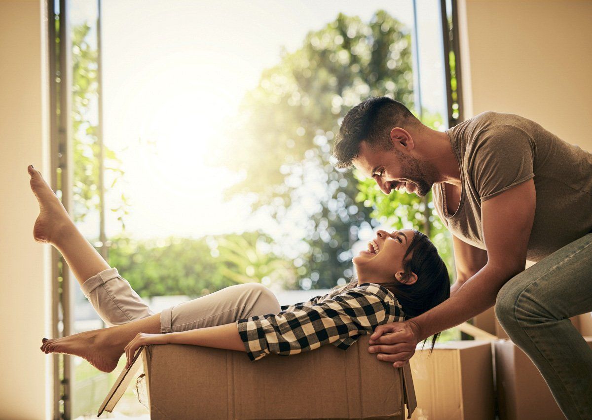 Couple with moving boxes