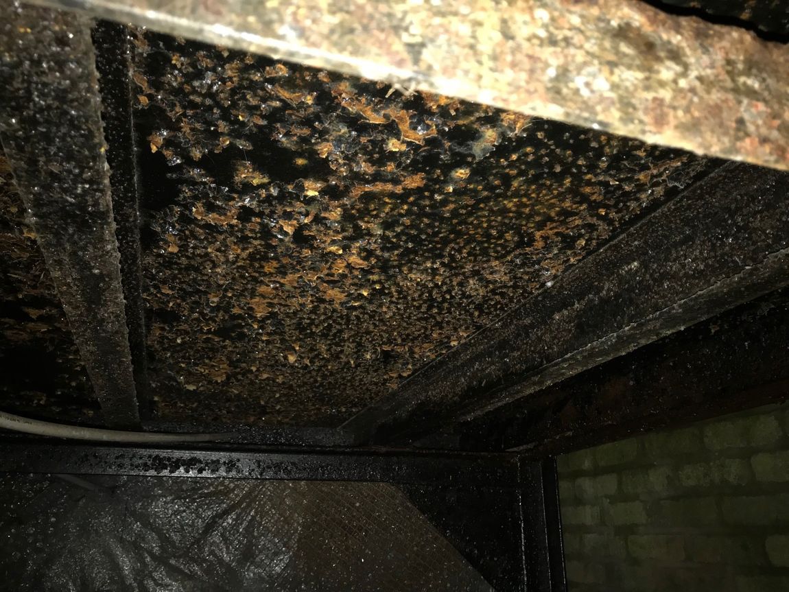 An old and worn-out oil tank