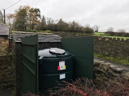 Steel and plastic tank installation