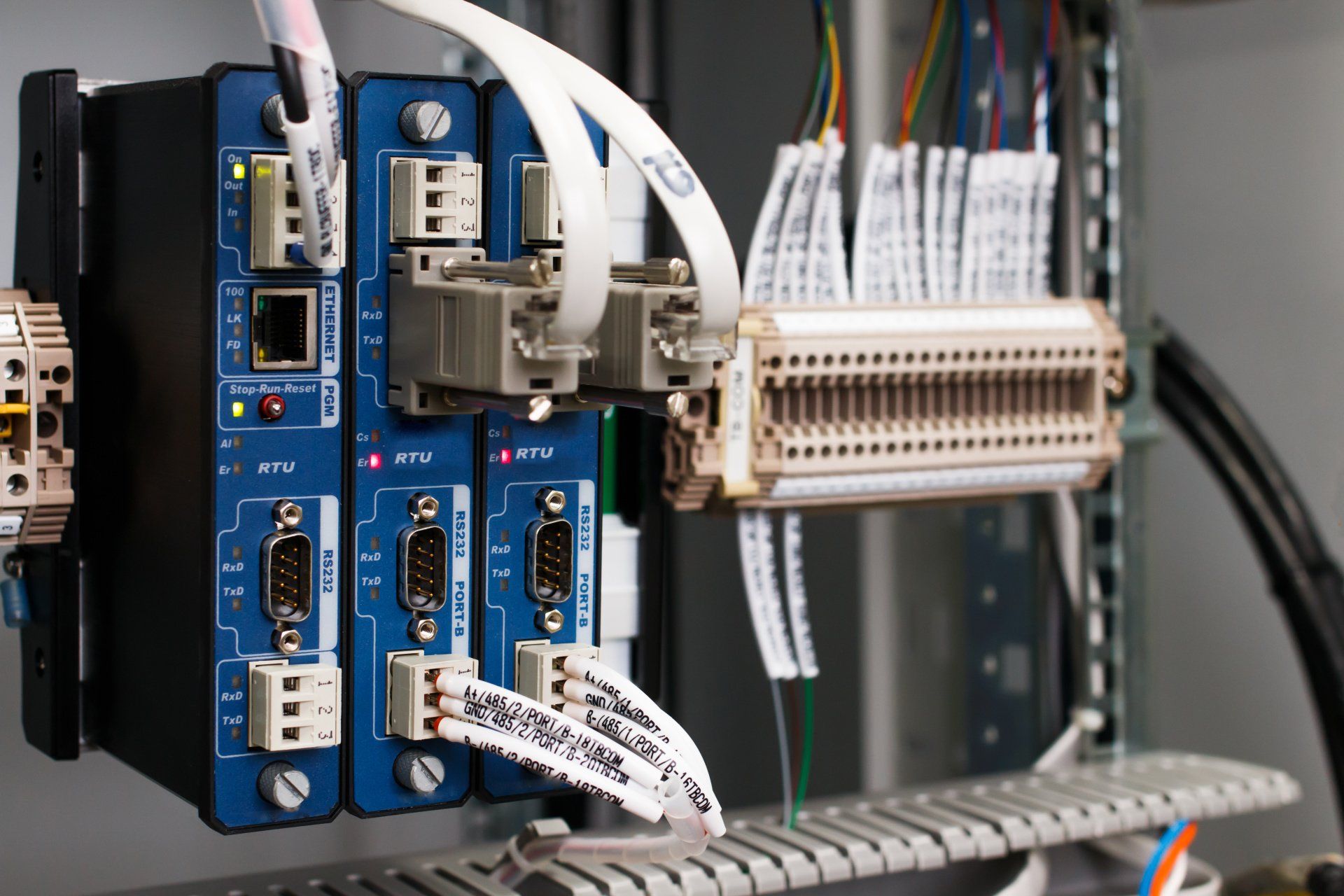 A bunch of wires are connected to a control panel