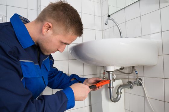 Plumbing Repair — Plumber Fixing Sink in Roxboro, NC Plumbing Repair — Plumber Fixing Sink in Roxboro, NC
