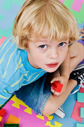 Boy playing and looking up