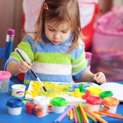 Little Girl Painting — Child Care in Victorville, CA
