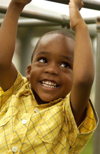 Boy on Playground — Child Care in Victorville, CA