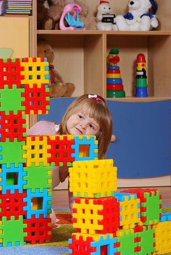 Girl playing in Preschool — Child Care in Victorville, CA
