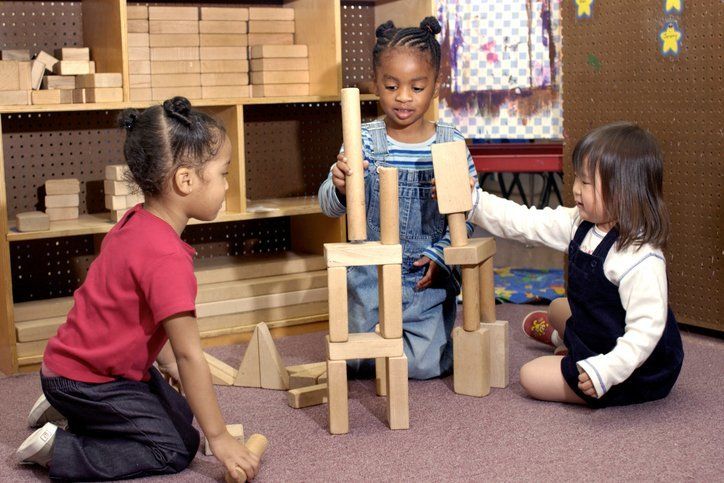 Children playing with building blocks