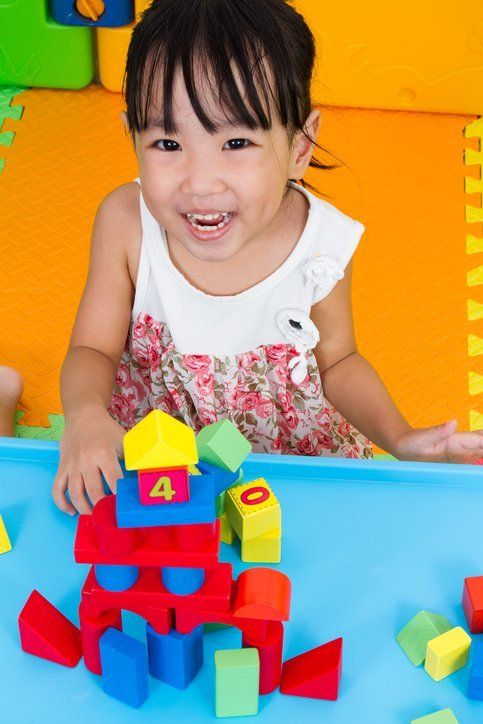 Girl Playing Wooden Blocks