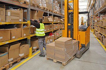 Workers Comp Attorney — Worker Fixing the Boxes in Aiken, SC Workers Comp Attorney — Worker Fixing the Boxes in Aiken, SC