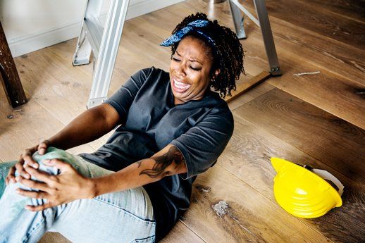 A women getting injured due to slip and fall. A women getting injured due to slip and fall.