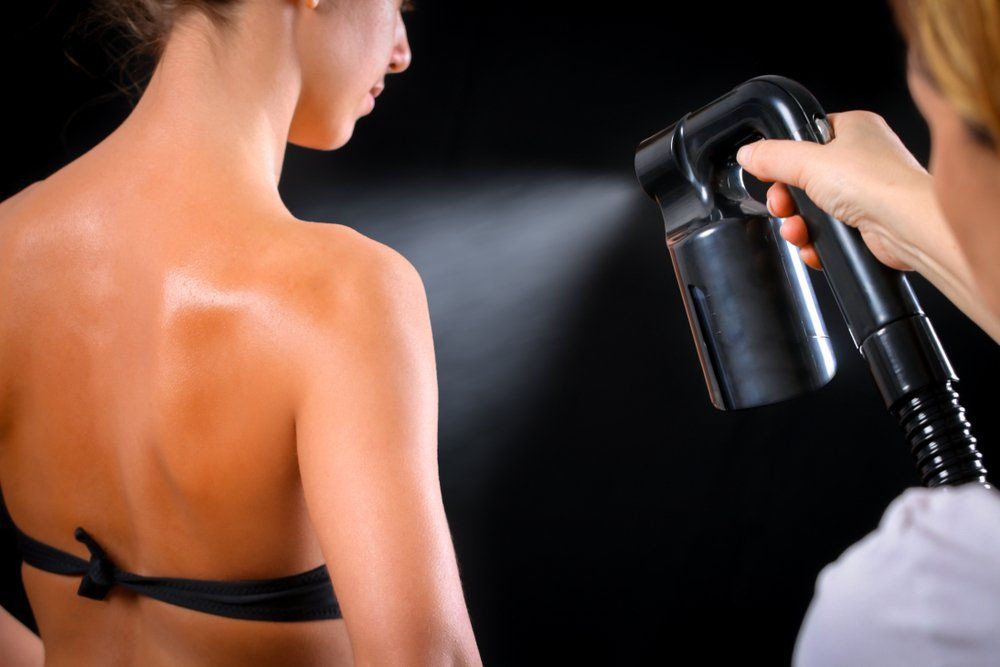 Woman Getting Spray Tan — VR Mobile Beauty Therapy In Oxenford QLD