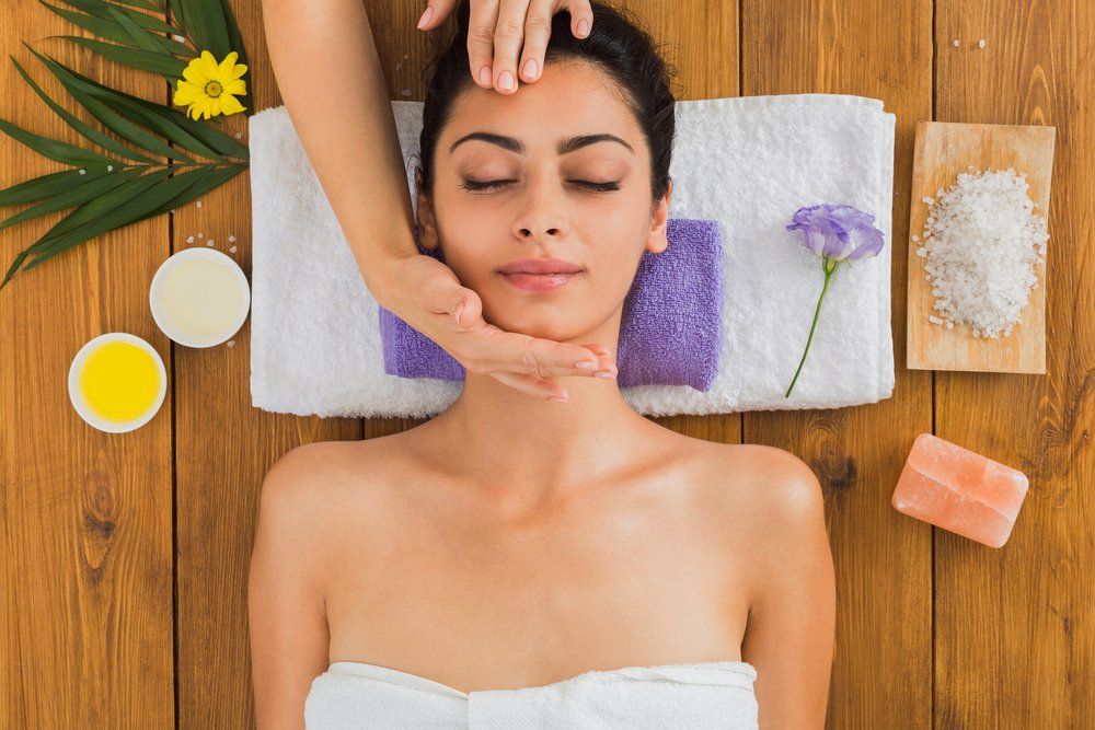 Woman Getting Facial and Massage — VR Mobile Beauty Therapy In Oxenford QLD