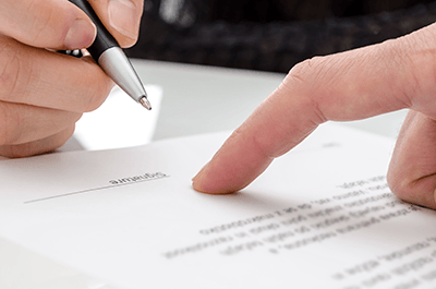 Lawyer Signing on a Paper — Medina County, OH — Laribee & Hertrick, LLP