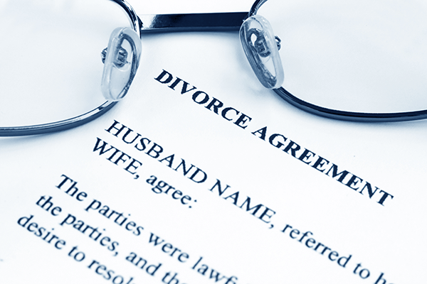 Glasses on a Divorce Agreement Form — Medina County, OH — Laribee & Hertrick, LLP Glasses on a Divorce Agreement Form — Medina County, OH — Laribee & Hertrick, LLP