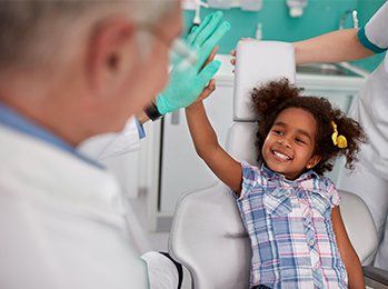 Lovely Kid in Dental Chair with Dentist — Palmdale, CA — Posada Dental Practice Lovely Kid in Dental Chair with Dentist — Palmdale, CA — Posada Dental Practice