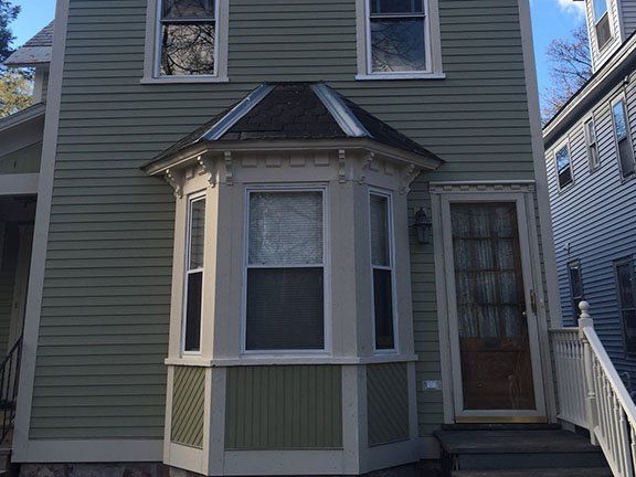 House with Clear Siding - Siding Contractor in Essex Junction, VT