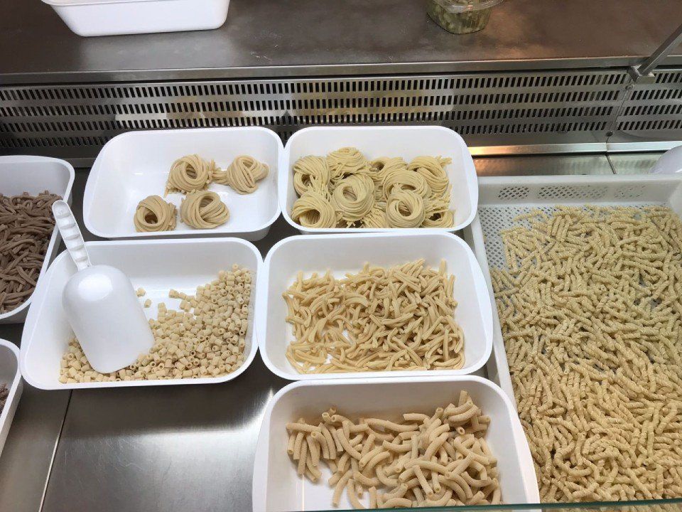 Counter with different types of fresh pasta
