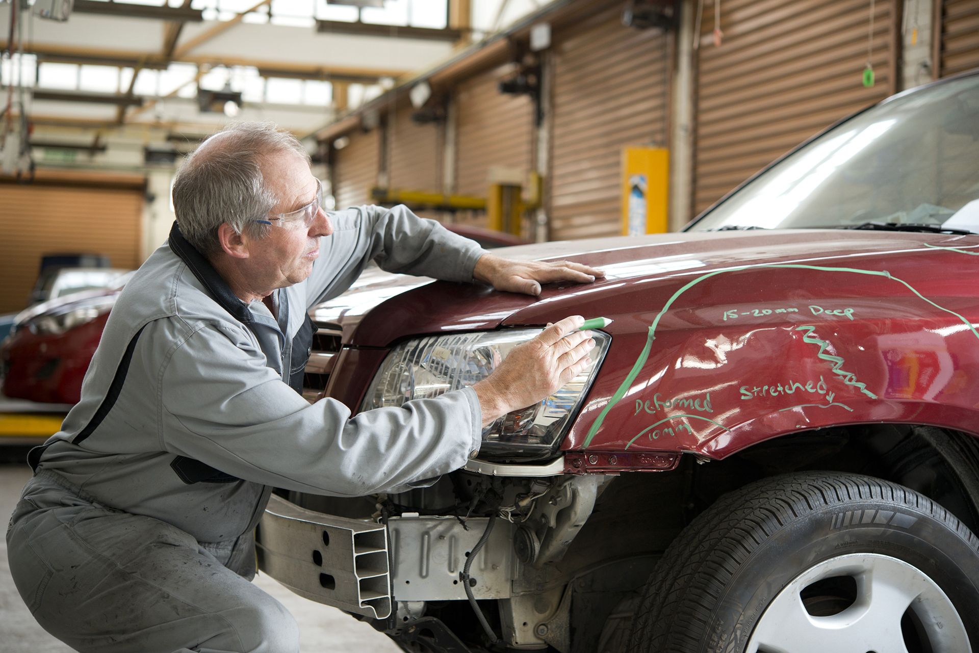 Car being marked for collision repair Greensboro, NC