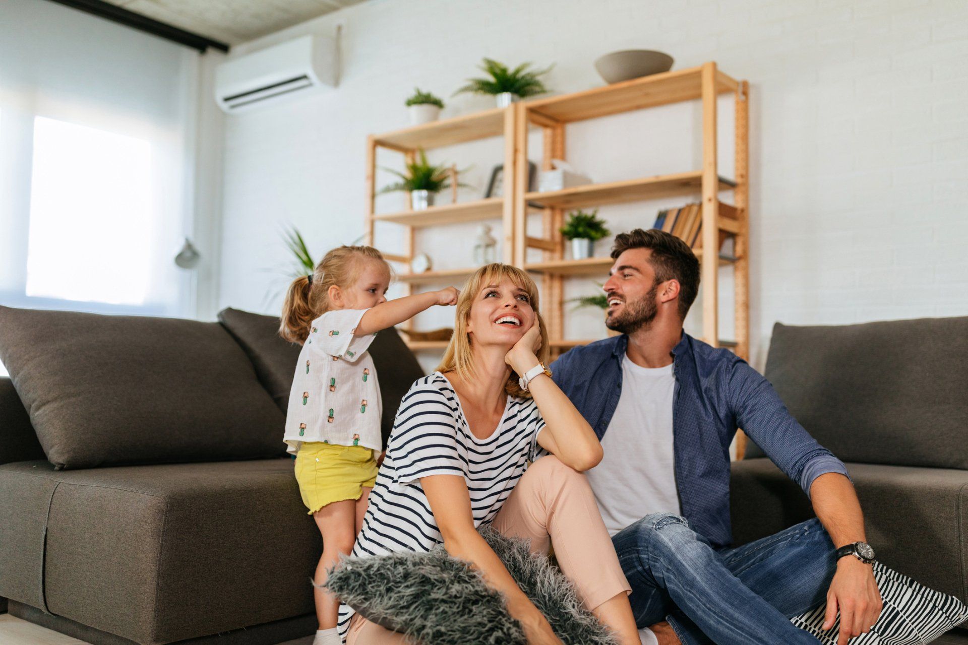 Family In The Living Room — San Rafael, CA — Trahan Mechanical Inc. Trahan brothers