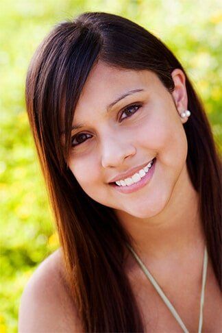 Teenage Girl Smiling— General Dentistry in Tallahassee, FL Teenage Girl Smiling— General Dentistry in Tallahassee, FL