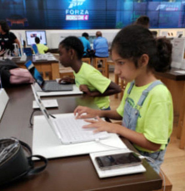 Students Using Laptop — Miami, FL — Meagan’s Academic Tutorial Center