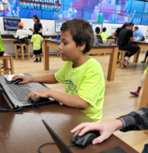Little Boy Focusing on Laptop — Miami, FL — Meagan’s Academic Tutorial Center