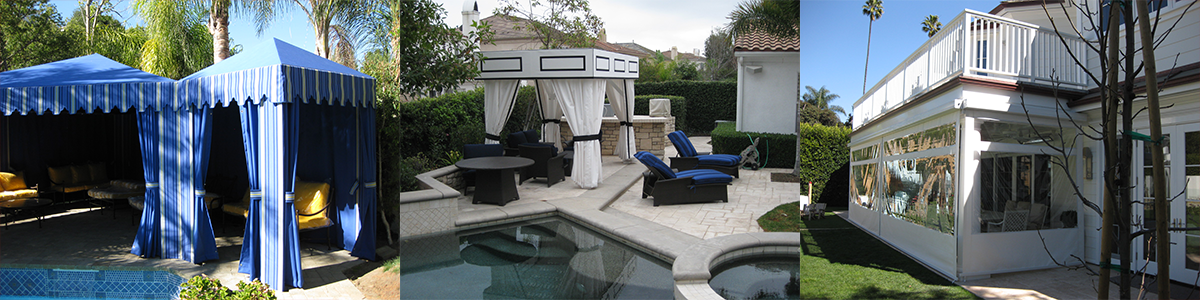 Blue event tent with draped fabric next to a white house and patio area in a sunny yard