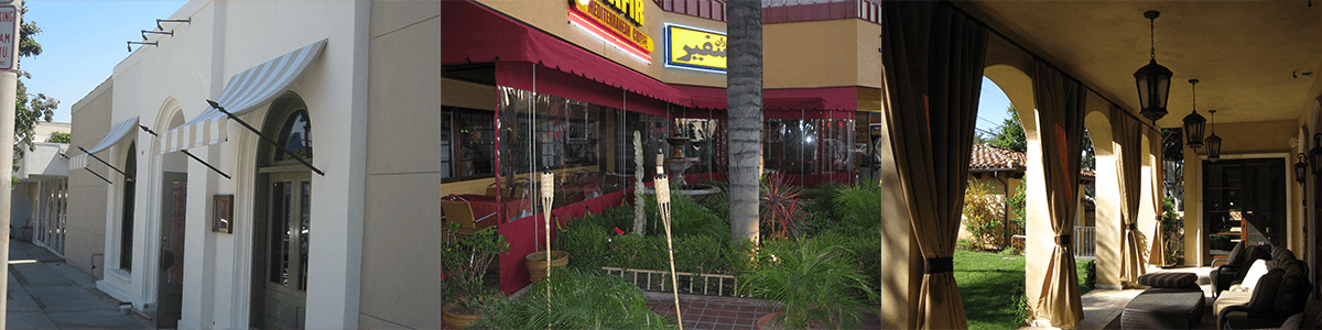 Storefronts with red awnings, potted plants, and a shaded walkway under trees