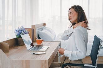 Young Woman Having A Neck Pain — Moulton, AL — Plaxco Chiropractic Clinic