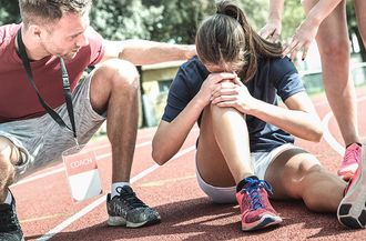 Female Athlete Getting Injured — Moulton, AL — Plaxco Chiropractic Clinic Female Athlete Getting Injured — Moulton, AL — Plaxco Chiropractic Clinic
