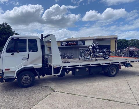 Motorcycle in Tow Truck — Towing and Transport in Sunshine Coast, QLD Motorcycle in Tow Truck — Towing and Transport in Sunshine Coast, QLD