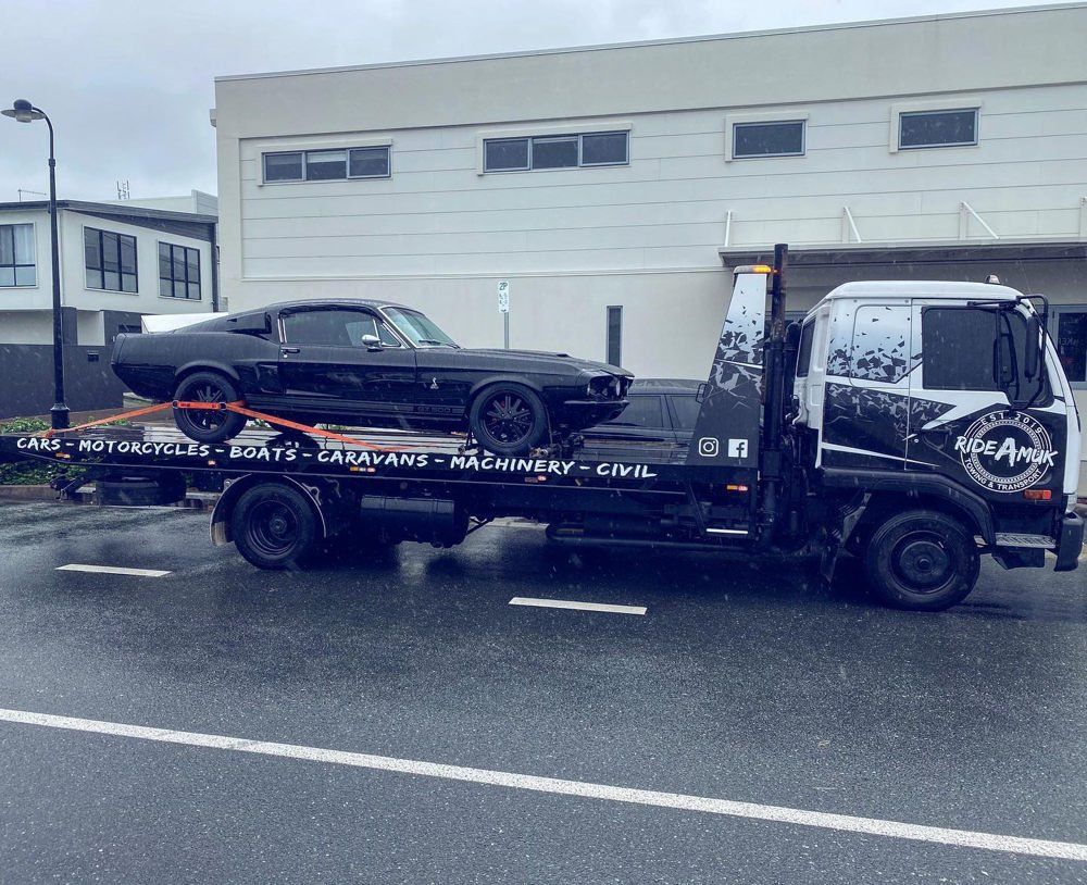 Black Car on Tow Truck — Towing and Transport in Sunshine Coast, QLD