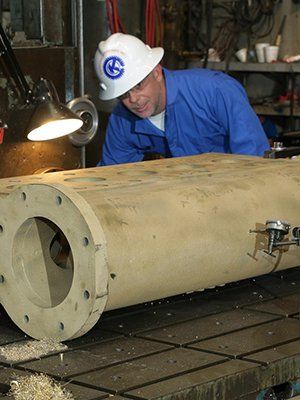 Technician Inspecting Industrial Equipment, Corpus Christi & Odessa TX