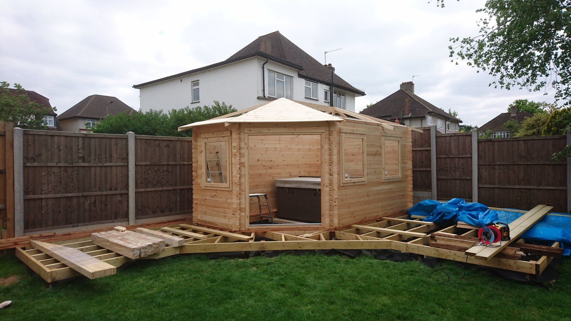 Process of a log cabin being built
