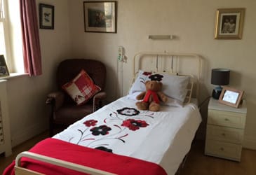 bed with red prints