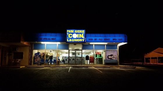 Woman satisfied with our coin operated laundry service in Dothan, AL