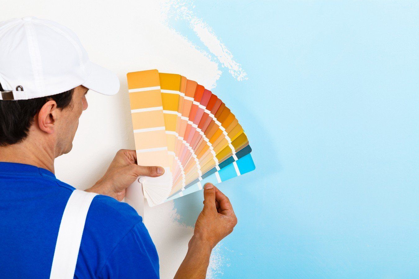 Contact — Painter Looking at a Color Palette in Denver, CO
