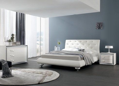 camera da letto con tappeto circolare