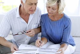 Old couple planning their retirement 