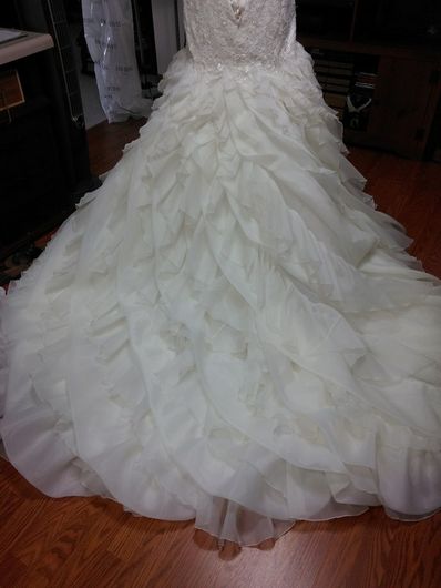 Tailor sewing a new dress in Onalaska
