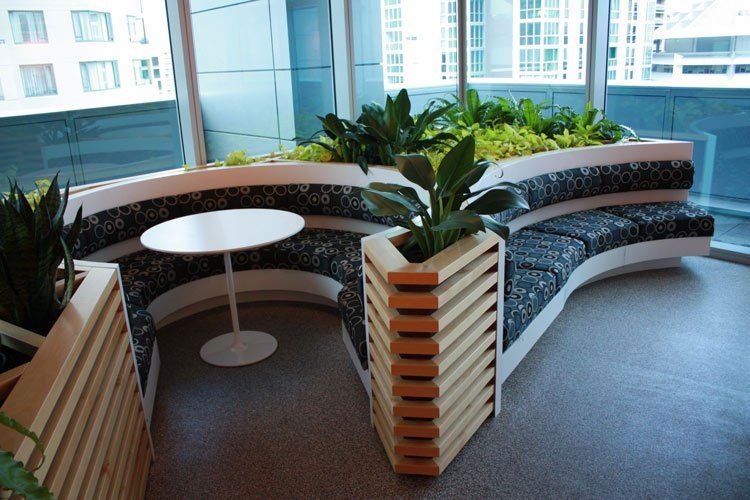restaurant booth with white solid surface table
